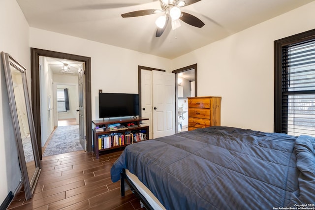 1019 Chicago Blvd, San Antonio, TX 78210 - bedroom with dark wood finished floors, baseboards, and a ceiling fan