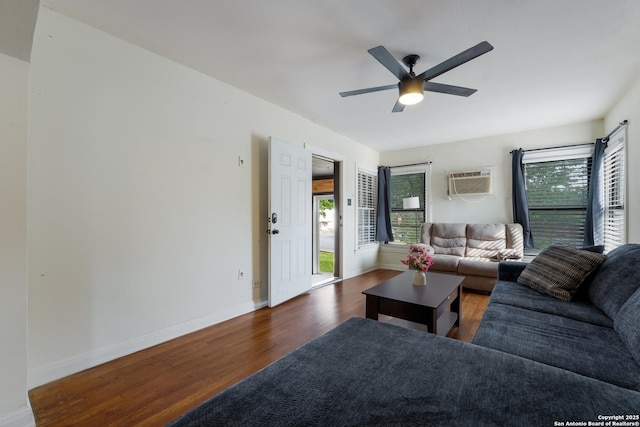 1019 Chicago Blvd, San Antonio, TX 78210 - living room featuring wood finished floors, ceiling fan, baseboards, and an AC wall unit