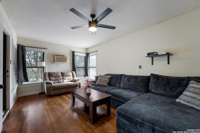 1019 Chicago Blvd, San Antonio, TX 78210 - living room featuring a wall mounted air conditioner, wood finished floors, a ceiling fan, and baseboards