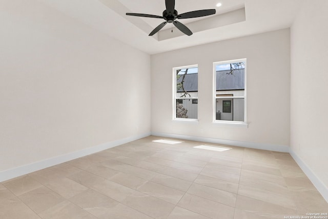 33 Peace Pipe, Wimberley, TX 78676 - spare room featuring a raised ceiling, baseboards, light tile patterned flooring, ceiling fan, and recessed lighting