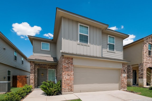 4015 Evaporite Trl, San Antonio, TX 78253 - view of front of property with board and batten siding, brick siding, cooling unit, and an attached garage