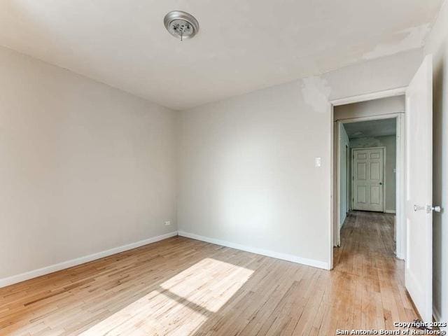 210 Harwood, San Antonio, TX 78213 - unfurnished room with light wood-style flooring and baseboards