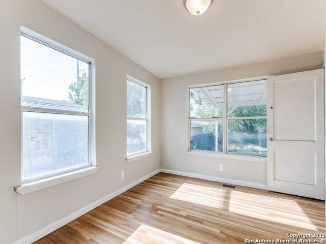 210 Harwood, San Antonio, TX 78213 - unfurnished room with baseboards and light wood finished floors