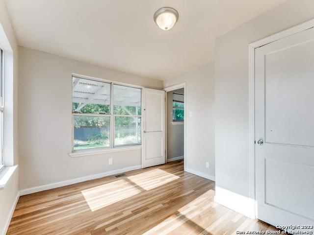 210 Harwood, San Antonio, TX 78213 - unfurnished room featuring light wood-type flooring and baseboards