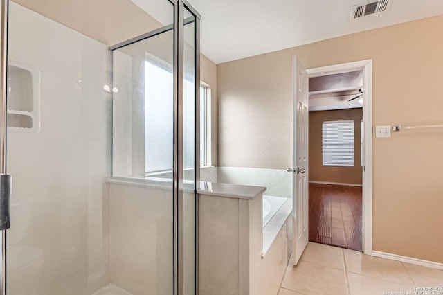3803 Ponderosa Bnd, San Antonio, TX 78261 - bathroom with a stall shower, healthy amount of natural light, and a bath