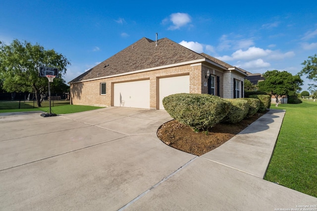 364 Stone Trl, Castroville, TX 78009 - view of side of property featuring brick siding, a yard, and driveway