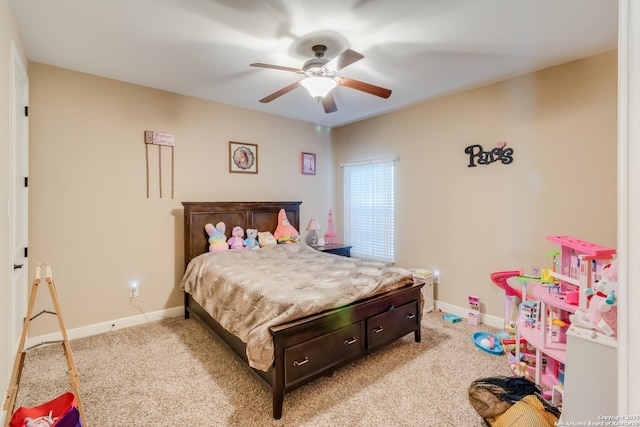 364 Stone Trl, Castroville, TX 78009 - bedroom featuring light carpet, baseboards, and a ceiling fan