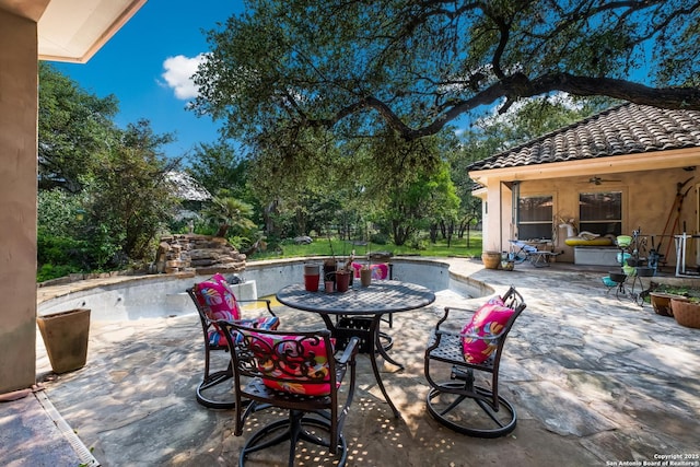 10402 Oak Forest Way, New Braunfels, TX 78132 - view of patio / terrace featuring an empty pool, a ceiling fan, and outdoor dining area