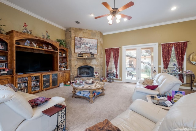 10402 Oak Forest Way, New Braunfels, TX 78132 - carpeted living room featuring crown molding, a ceiling fan, a stone fireplace, and recessed lighting