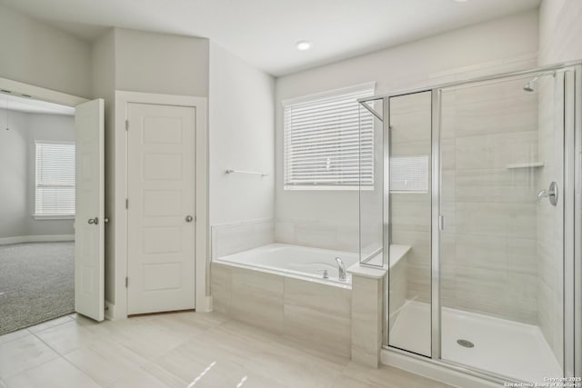 29414 Angelfish Blvd, Boerne, TX 78006 - full bathroom with a bath, a stall shower, and tile patterned floors