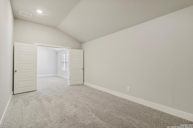 29414 Angelfish Blvd, Boerne, TX 78006 - unfurnished bedroom with lofted ceiling, carpet floors, and baseboards