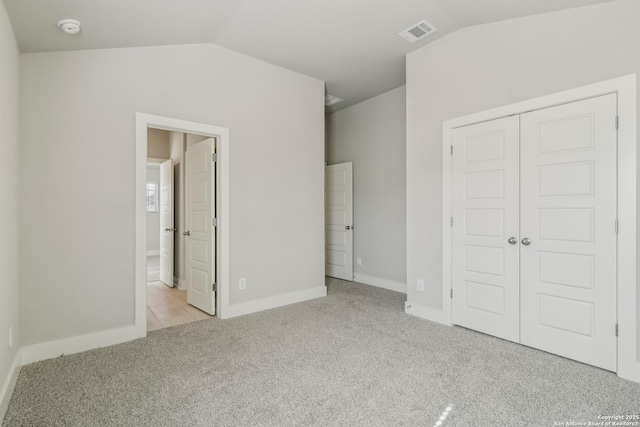 29414 Angelfish Blvd, Boerne, TX 78006 - unfurnished bedroom with lofted ceiling, carpet flooring, a closet, and baseboards
