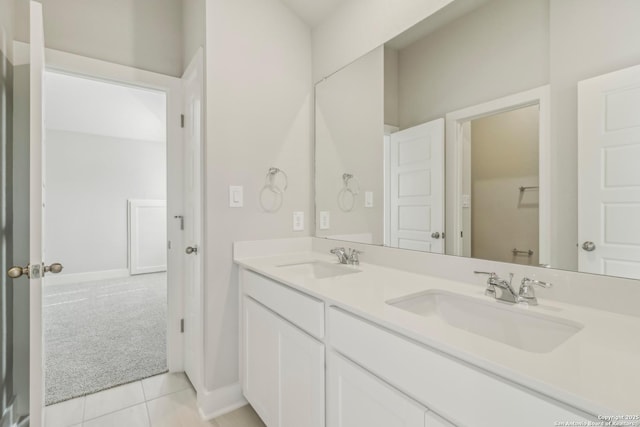 29414 Angelfish Blvd, Boerne, TX 78006 - bathroom featuring double vanity, tile patterned floors, and baseboards