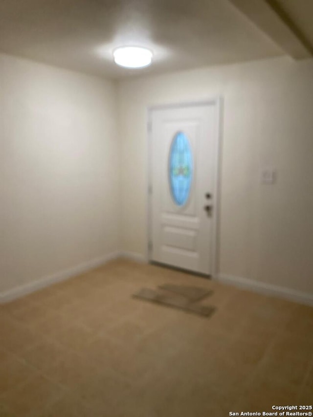1336 Churing, San Antonio, TX 78245 - foyer featuring baseboards and light colored carpet