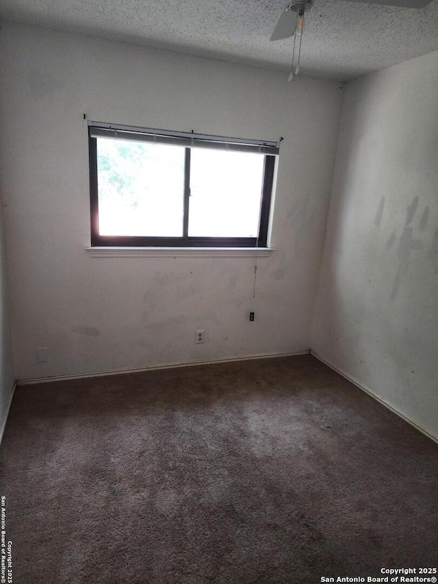 2960 Ash Fld, San Antonio, TX 78245 - spare room with plenty of natural light, carpet flooring, a textured ceiling, and a ceiling fan