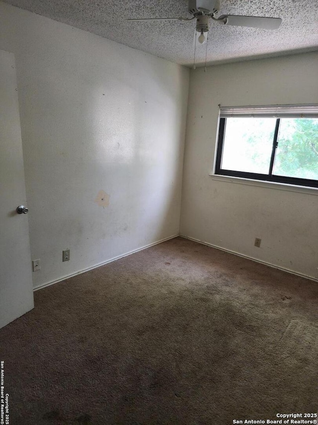 2960 Ash Fld, San Antonio, TX 78245 - carpeted spare room with a ceiling fan, a textured ceiling, and baseboards