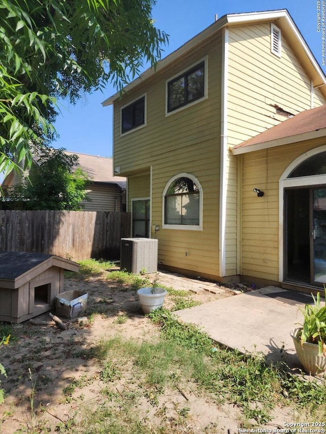 2960 Ash Fld, San Antonio, TX 78245 - rear view of property featuring cooling unit and a patio area