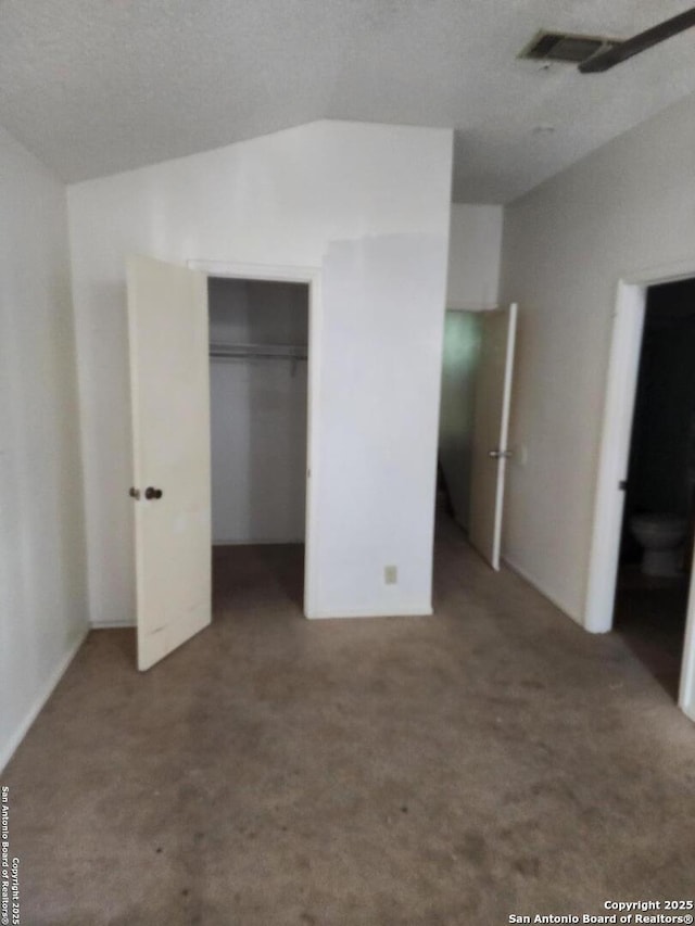 2960 Ash Fld, San Antonio, TX 78245 - unfurnished bedroom featuring carpet floors, vaulted ceiling, and a closet