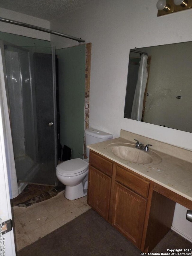 2960 Ash Fld, San Antonio, TX 78245 - full bathroom with a stall shower, vanity, toilet, and tile patterned flooring
