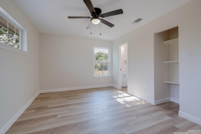 7811 Stagecoach, San Antonio, TX 78227 - unfurnished room with ceiling fan, light wood-style floors, and baseboards