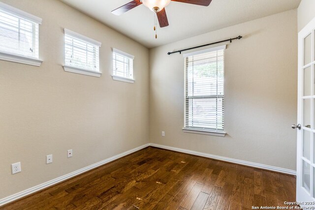 27511 Smokey Chase, Boerne, TX 78015 - empty room featuring a ceiling fan, wood finished floors, and baseboards