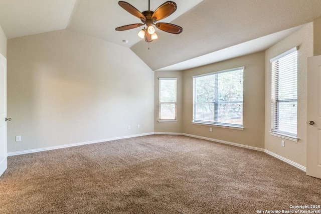 27511 Smokey Chase, Boerne, TX 78015 - spare room with lofted ceiling, carpet, a ceiling fan, and baseboards