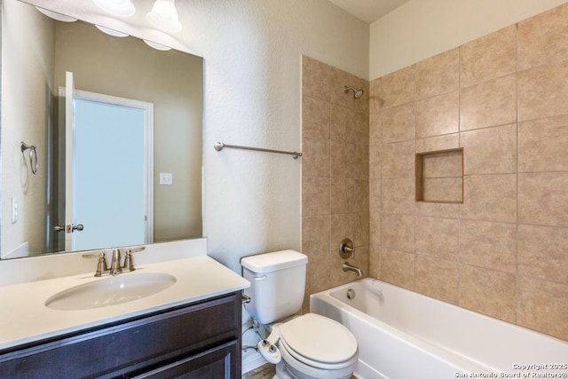 27511 Smokey Chase, Boerne, TX 78015 - full bathroom featuring toilet, vanity, shower / washtub combination, and a textured wall