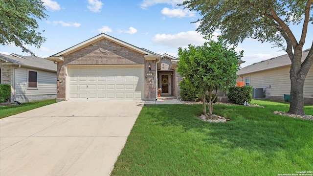 629 Planters Pass, Schertz, TX 78154 - ranch-style home featuring concrete driveway, an attached garage, a front lawn, brick siding, and cooling unit