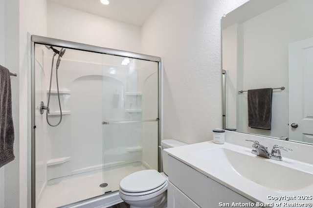 14370 Palm, San Antonio, TX 78253 - full bath featuring a shower stall, vanity, and toilet