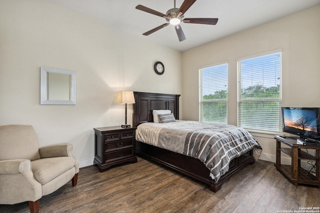1015 Broken Spoke, Canyon Lake, TX 78133 - bedroom with baseboards, dark wood finished floors, and ceiling fan
