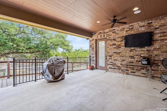 1015 Broken Spoke, Canyon Lake, TX 78133 - view of patio featuring a ceiling fan