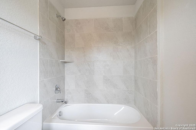 324 Mar Hl, Seguin, TX 78155 - bathroom featuring toilet and bathing tub / shower combination