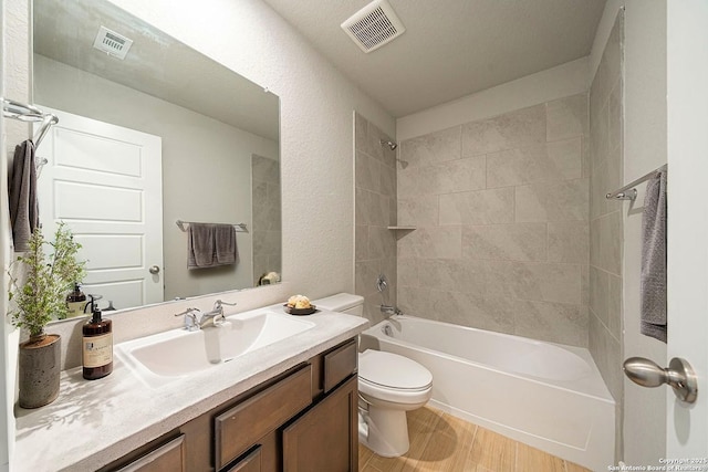 324 Mar Hl, Seguin, TX 78155 - full bathroom with toilet, vanity, and shower / bath combination