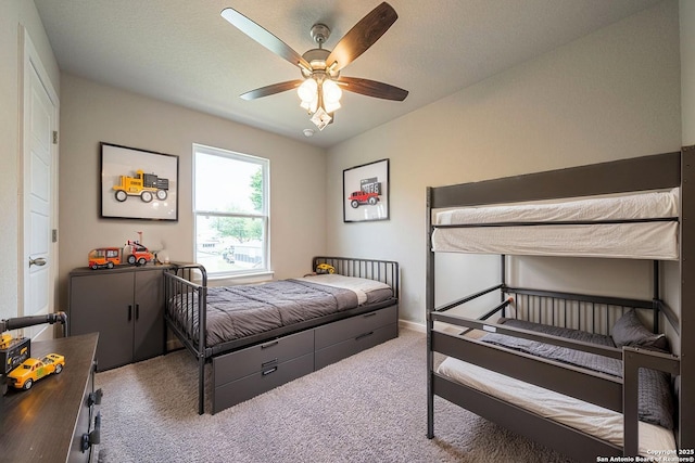 324 Mar Hl, Seguin, TX 78155 - bedroom featuring carpet floors, ceiling fan, and baseboards
