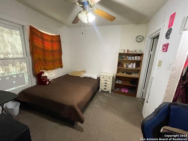 261 San Gabriel, San Antonio, TX 78237 - bedroom with carpet flooring and ceiling fan