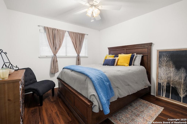 5006 Las Campanas, San Antonio, TX 78233 - bedroom with wood finished floors, baseboards, and a ceiling fan