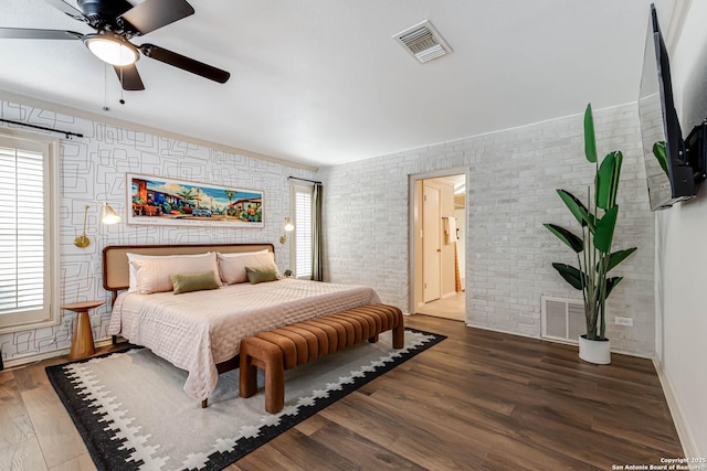113 Wickford, Castle Hills, TX 78213 - bedroom with wood finished floors, brick wall, and a ceiling fan