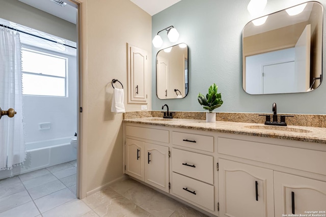 113 Wickford, Castle Hills, TX 78213 - bathroom featuring double vanity, toilet, baseboards, shower / tub combo with curtain, and tile patterned floors
