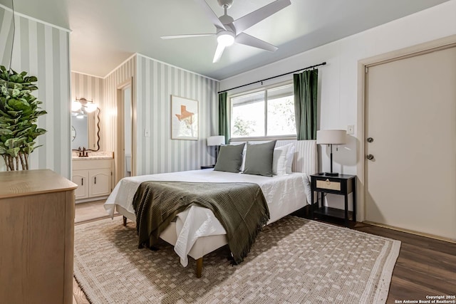 113 Wickford, Castle Hills, TX 78213 - bedroom with wood finished floors, ensuite bathroom, and ceiling fan