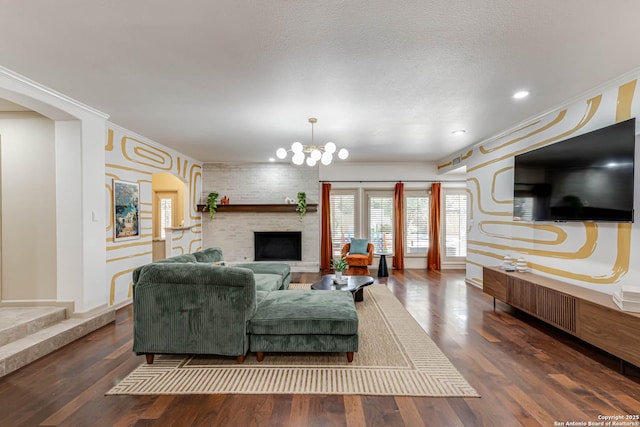 113 Wickford, Castle Hills, TX 78213 - living area with dark wood-type flooring, a chandelier, a brick fireplace, ornamental molding, and arched walkways