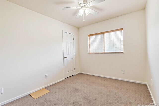 3634 Lazy Clover, San Antonio, TX 78261 - unfurnished room with carpet flooring, baseboards, and ceiling fan