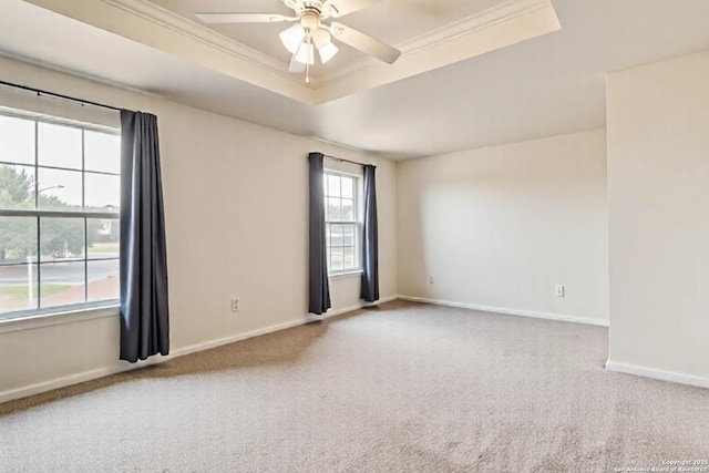3634 Lazy Clover, San Antonio, TX 78261 - spare room with a tray ceiling, carpet flooring, ceiling fan, baseboards, and ornamental molding