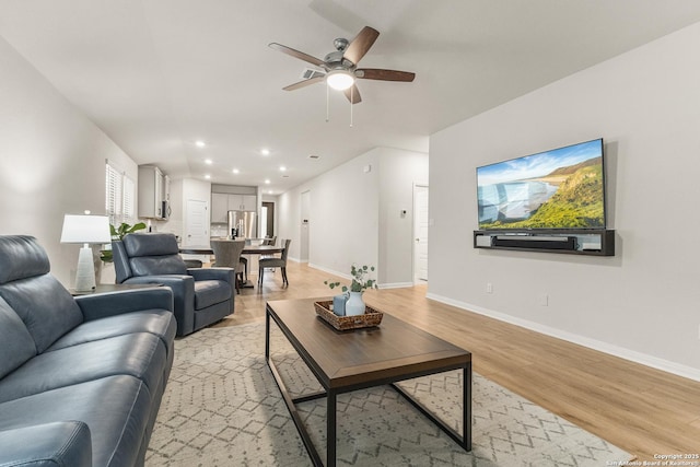 10226 Amaryllis, Boerne, TX 78006 - living area featuring ceiling fan, baseboards, light wood finished floors, and recessed lighting