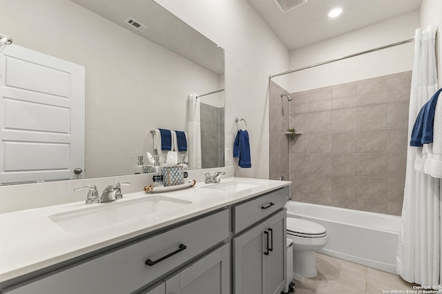 10226 Amaryllis, Boerne, TX 78006 - bathroom featuring toilet, shower / bath combo with shower curtain, double vanity, and tile patterned flooring