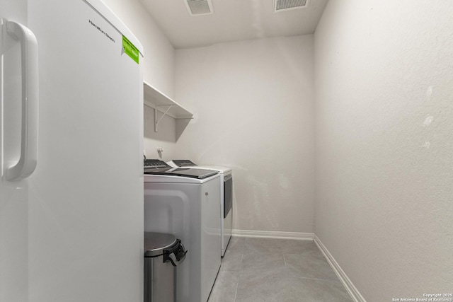 10226 Amaryllis, Boerne, TX 78006 - laundry room with washer and dryer and baseboards