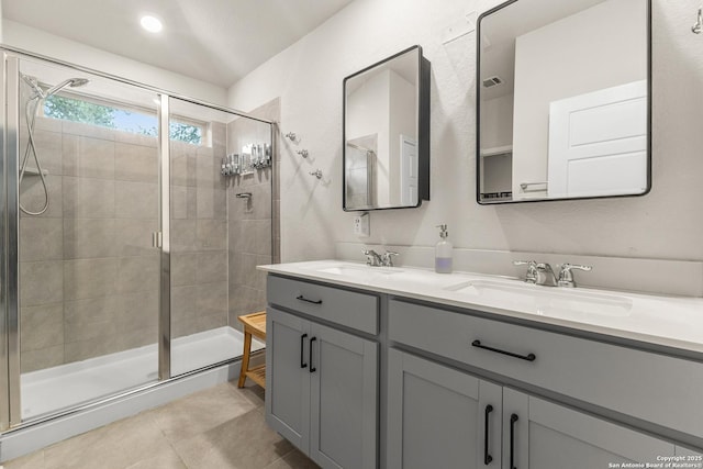 10226 Amaryllis, Boerne, TX 78006 - full bath featuring a shower stall, double vanity, and tile patterned floors