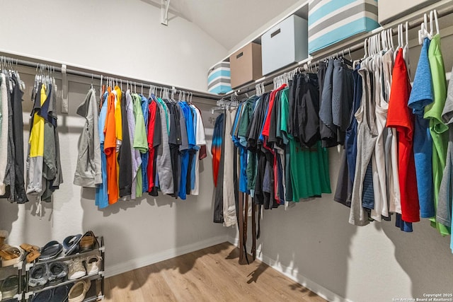 10226 Amaryllis, Boerne, TX 78006 - walk in closet featuring wood finished floors