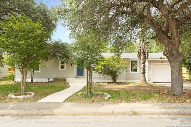 242 Babcock Rd, San Antonio, TX 78201 - view of front of home with an attached garage