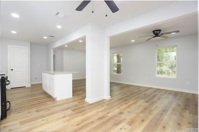 242 Babcock Rd, San Antonio, TX 78201 - unfurnished living room with ceiling fan, light wood-type flooring, baseboards, and recessed lighting