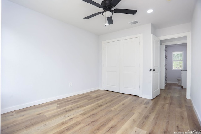 242 Babcock Rd, San Antonio, TX 78201 - unfurnished bedroom with baseboards, a closet, light wood-type flooring, recessed lighting, and a ceiling fan